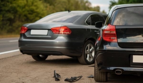 Two cars in a vehicle accident.